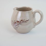 Pair of ceramic milk jugs signed La Roue Vallauris