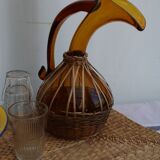 Glass and wicker decanter