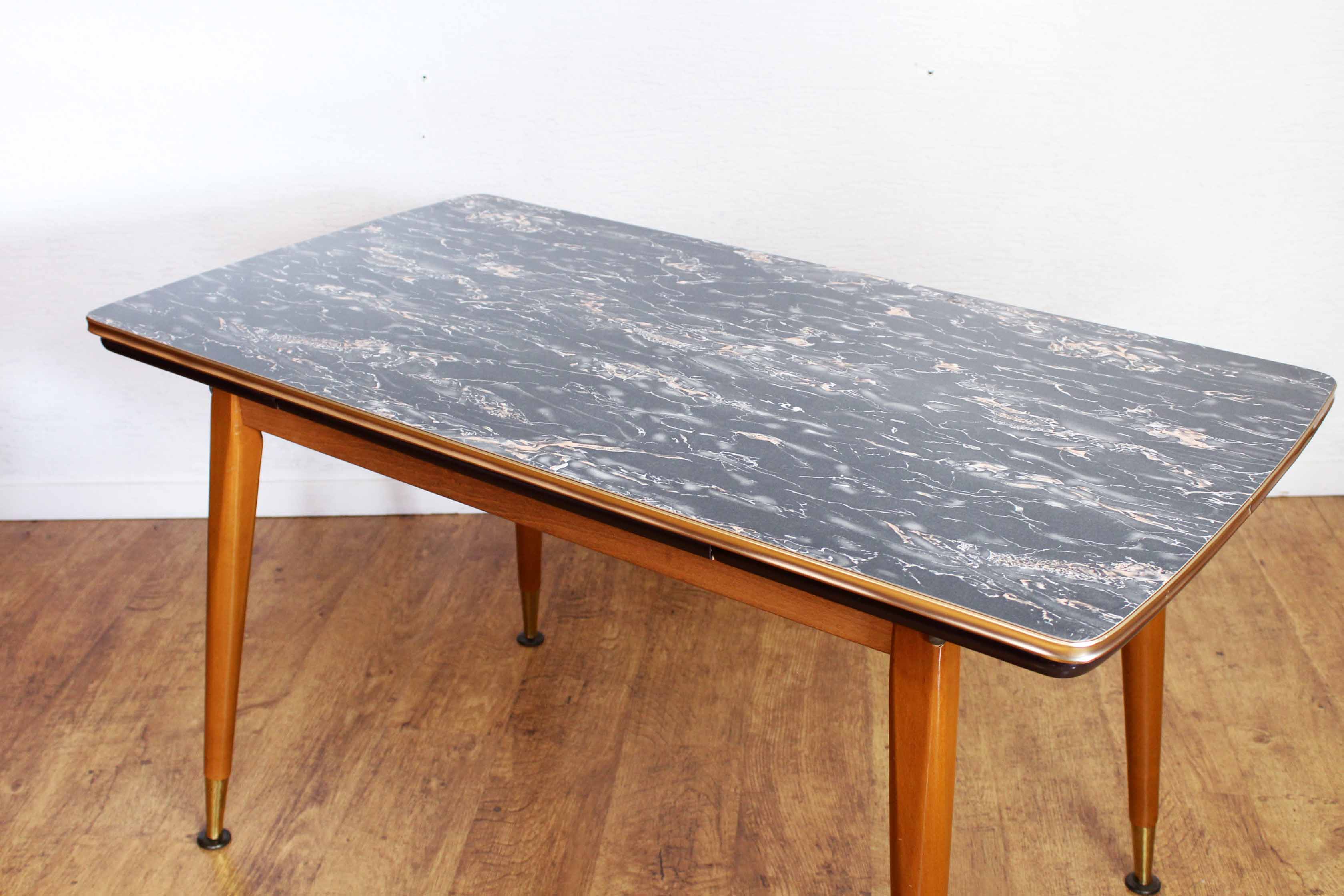 Table with compass feet from the 70s with "rise and fall" system