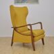 Mid-century Wingback armchair with folding footrest, 1960s
