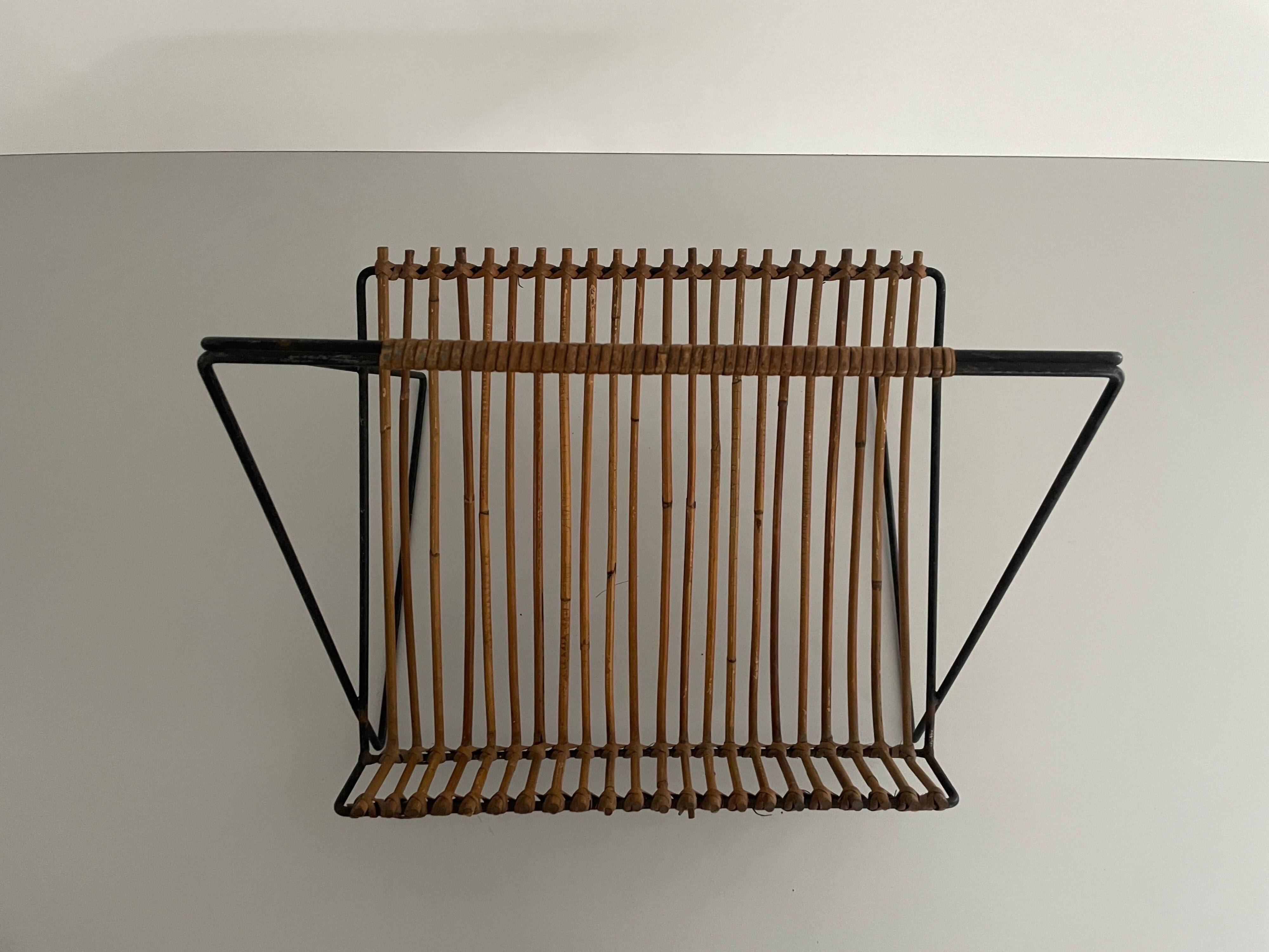 Mid-century black metal and rattan magazine rack, 1960, Italy