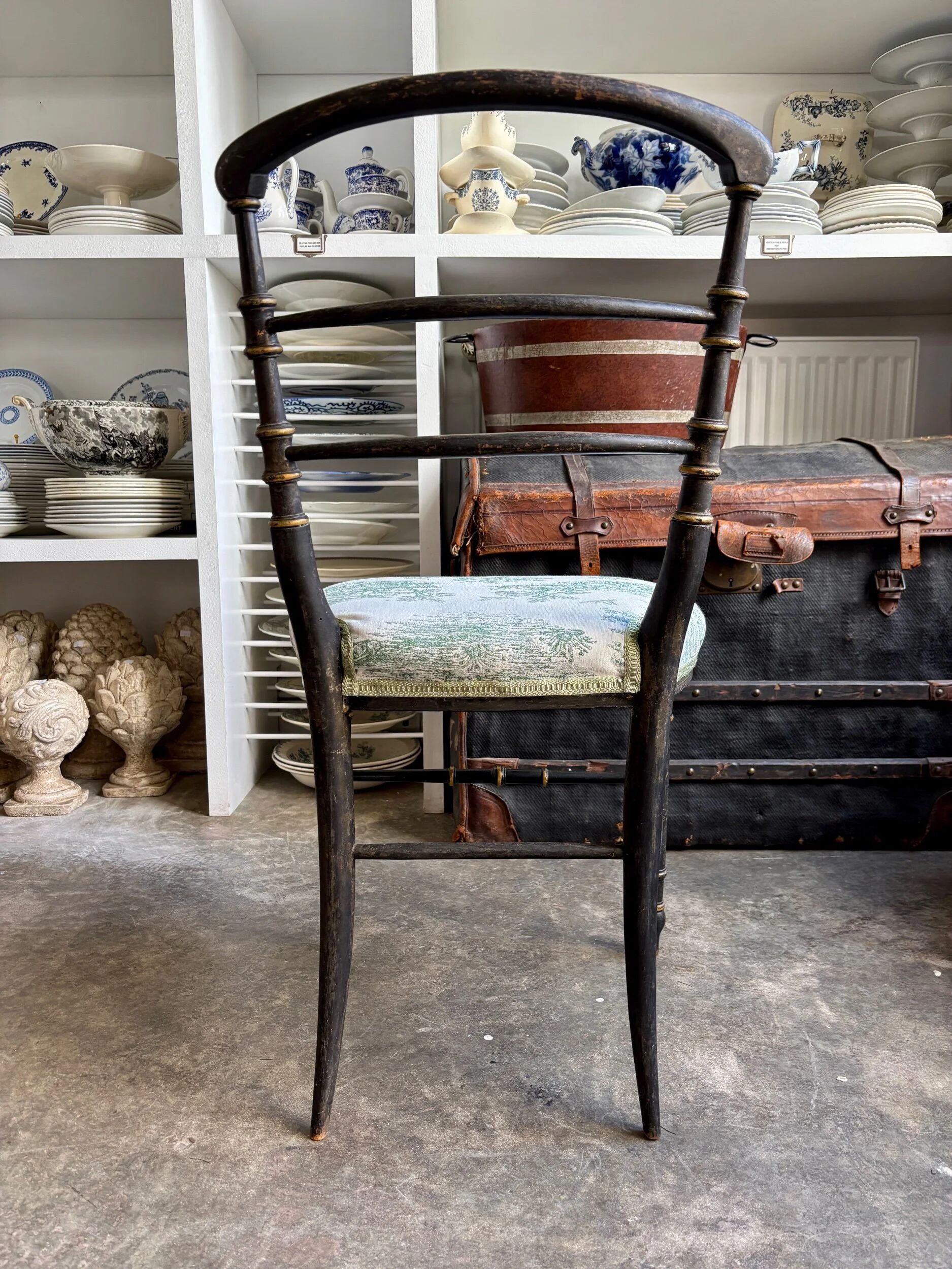 Napoleon III chair in blackened wood and green toile de Jouy.