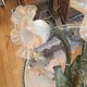 Bronze wall light patinated woman's head