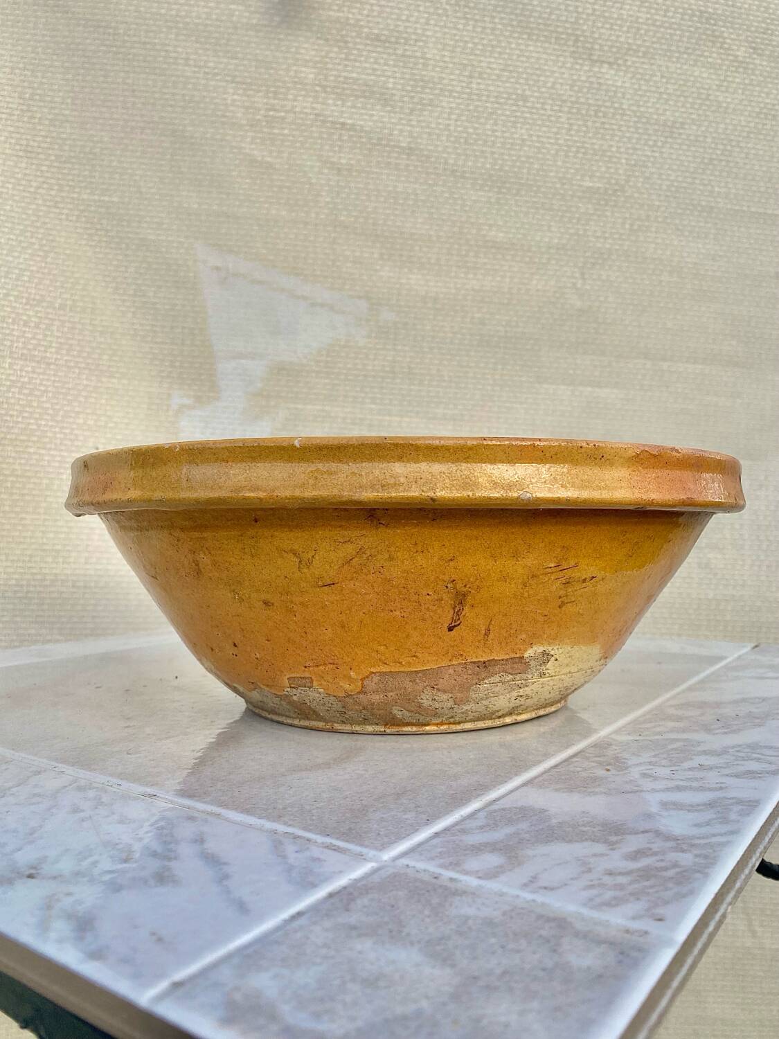 Old yellow glazed terracotta gresale