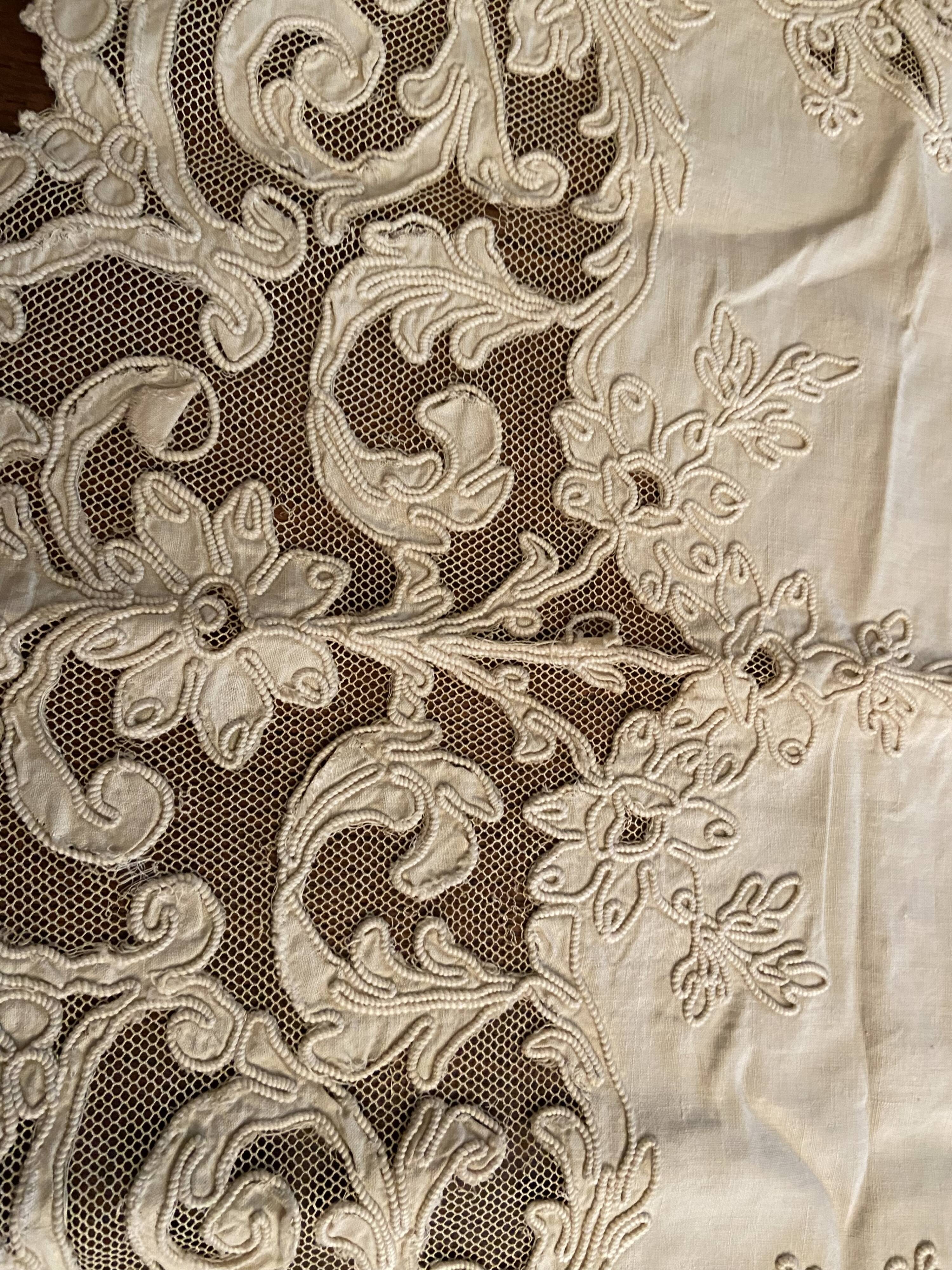 Sheet with embroidered decoration and openwork with cornucopia late nineteenth