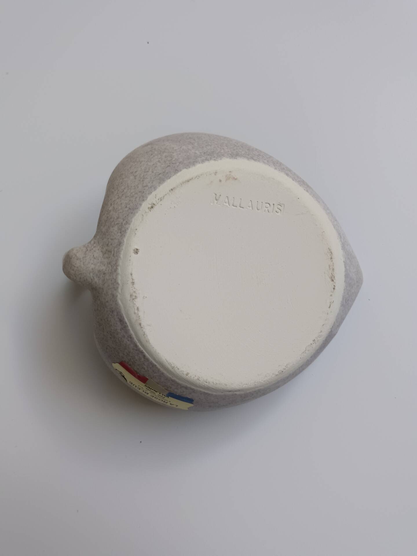 Vallauris grey candle holder with pink flowers, signed.