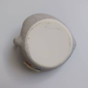 Vallauris grey candle holder with pink flowers, signed.