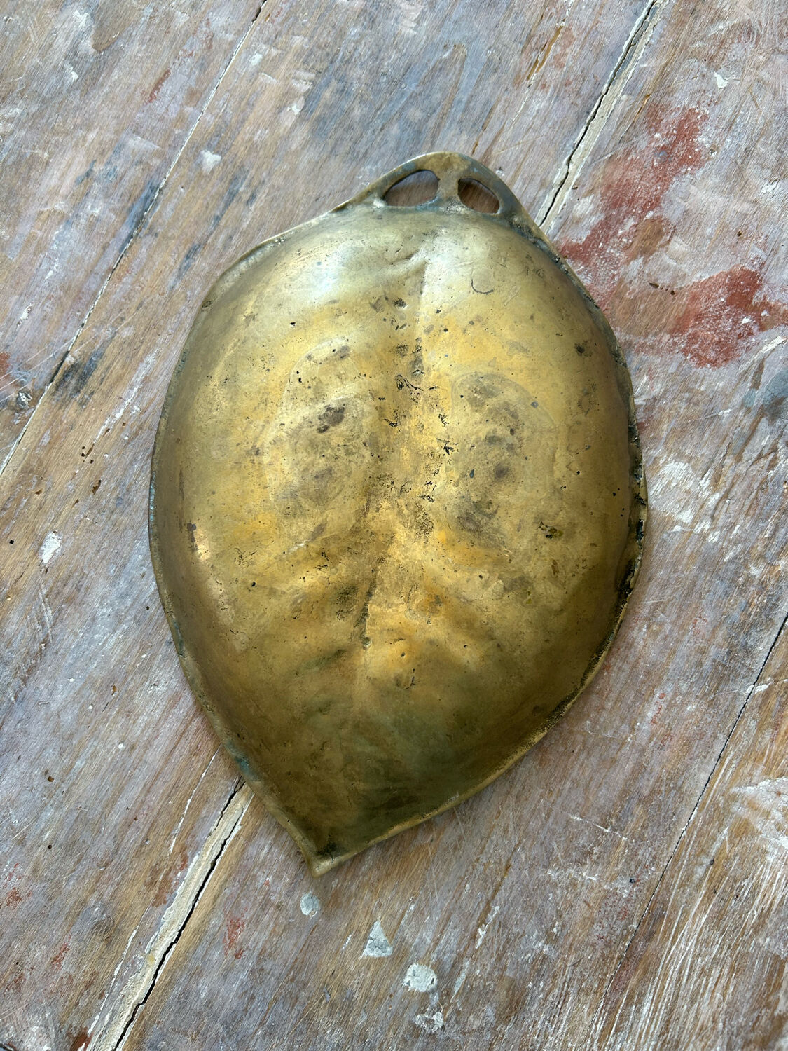 Old brass pocket vacuum, leaf.