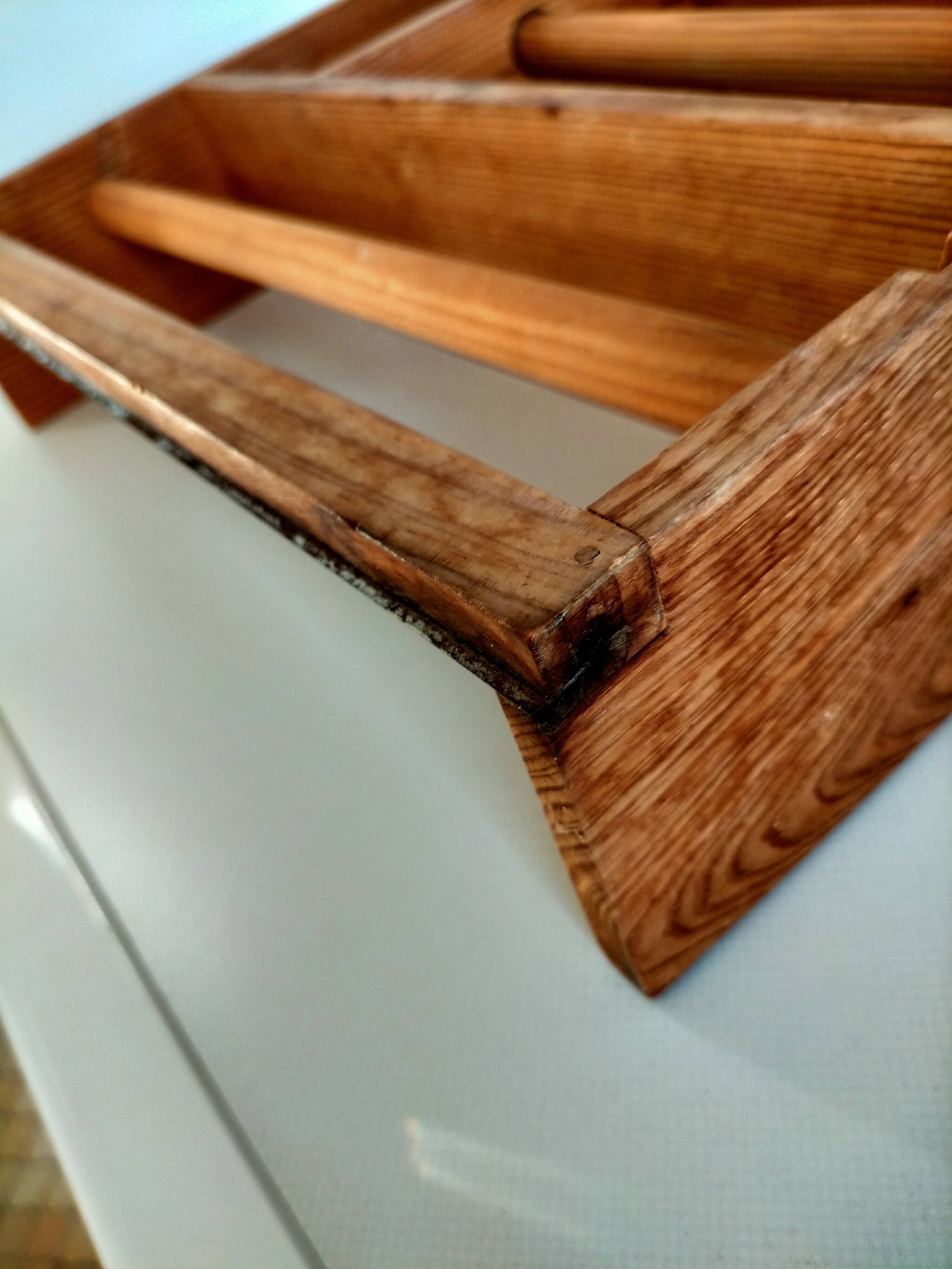 Wooden shelf with unroller wipes everything