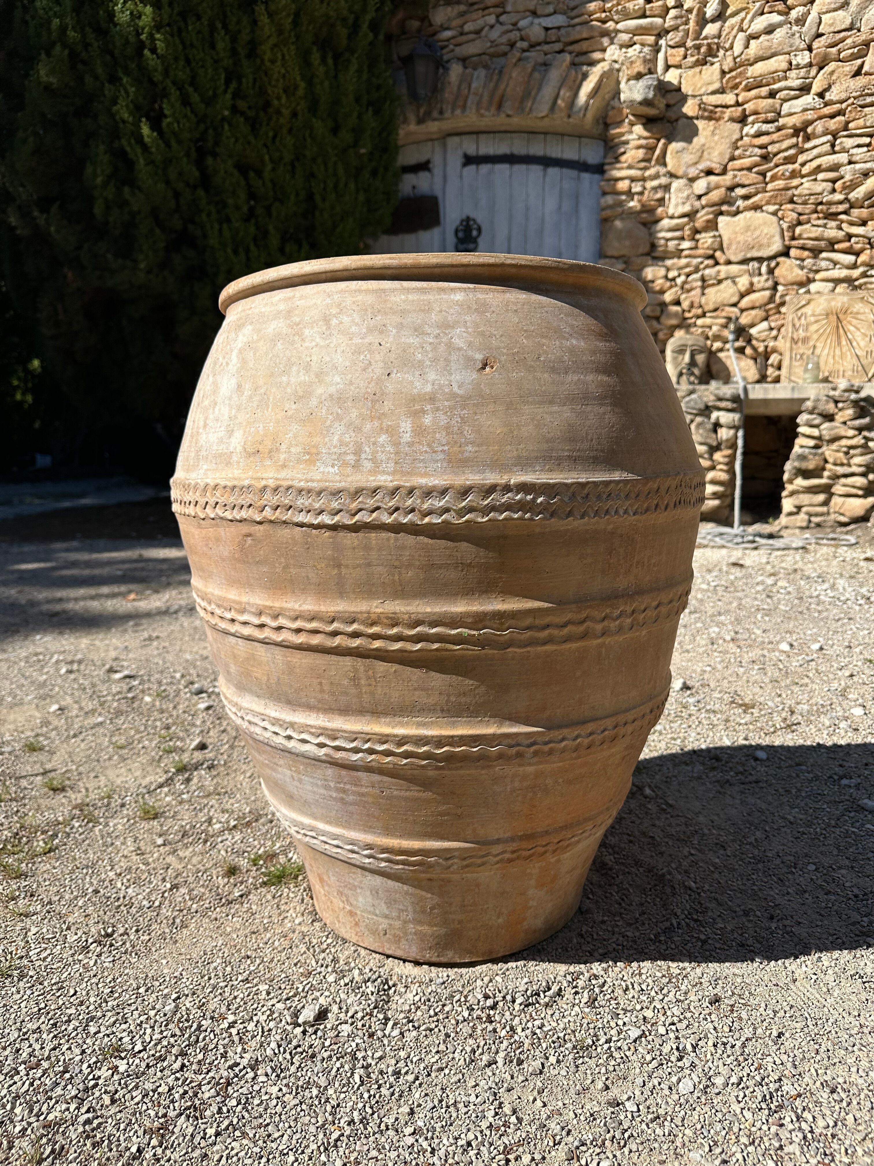 Ancient terracotta pottery jar from the 19th century.
