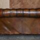 Restored leather Chesterfield sofa, walnut legs.