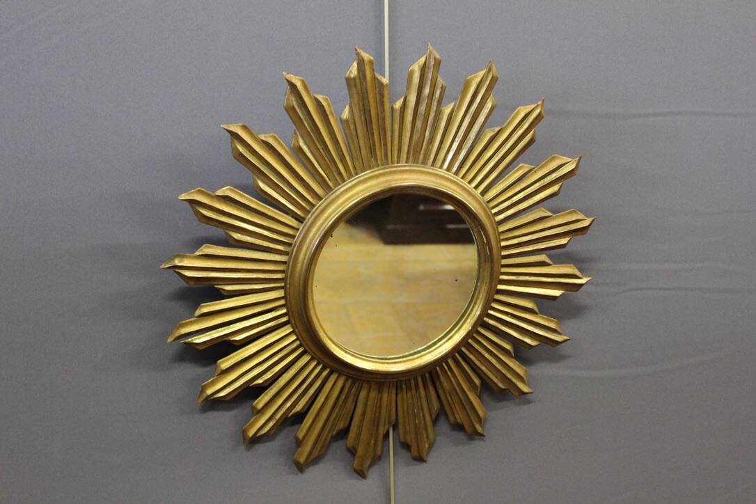 Sun mirror in gilded wood circa 1970