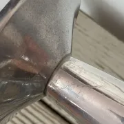 Pair of minimalist polished aluminium candle holders
