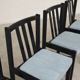 Set of 4 modernist black chairs with light blue ribbed fabric