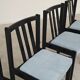 Set of 4 modernist black chairs with light blue ribbed fabric