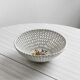 Openwork porcelain fruit bowl.