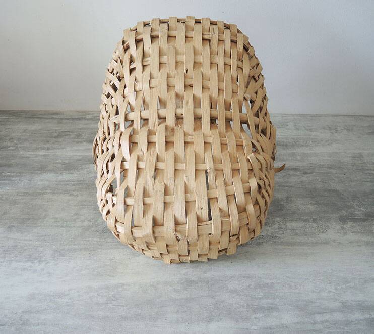 Old wicker basket / woven light leaves