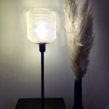 Table lamp with a yellow shade in vintage art deco style