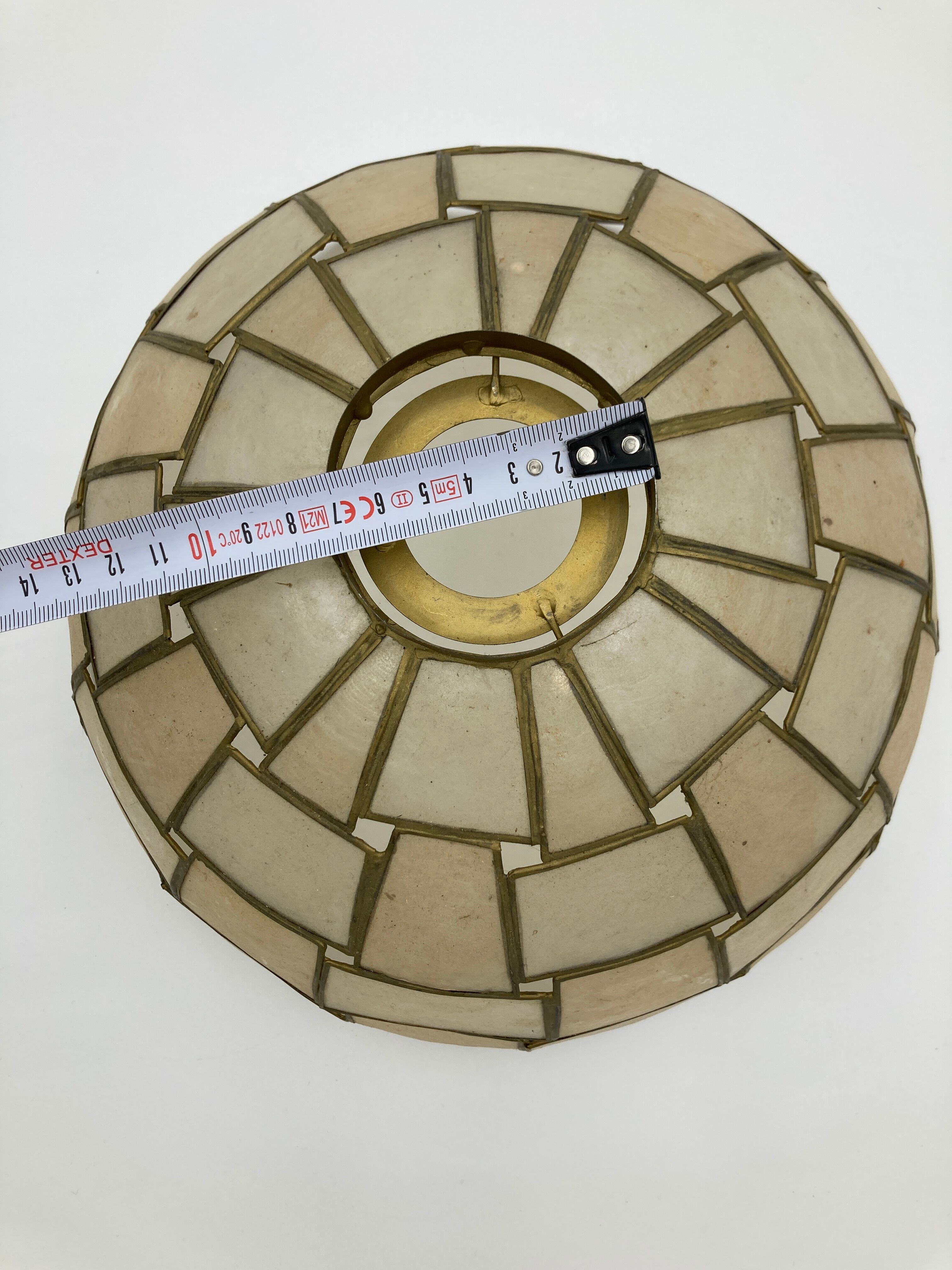 Suspension in geometric mother-of-pearl