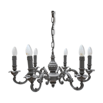 Beautiful bronze chandelier patinated beige-beige baroque volutes