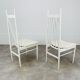 2 Scandinavian chairs with white bars from the 60s