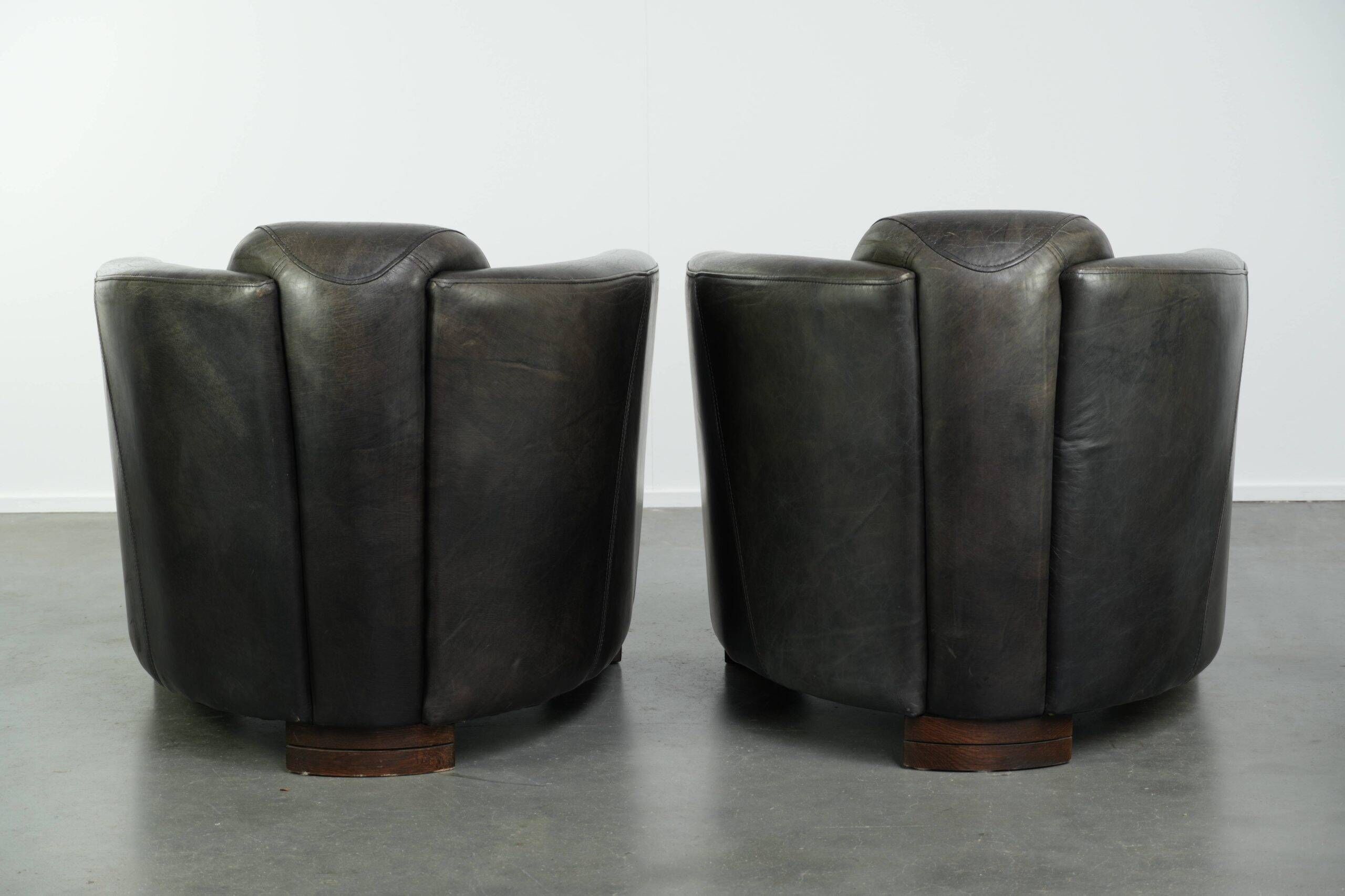 Ensemble vintage de 2 fauteuils en cuir de vachette au design Aviateur.