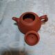 Yixing teapot in signed red clay