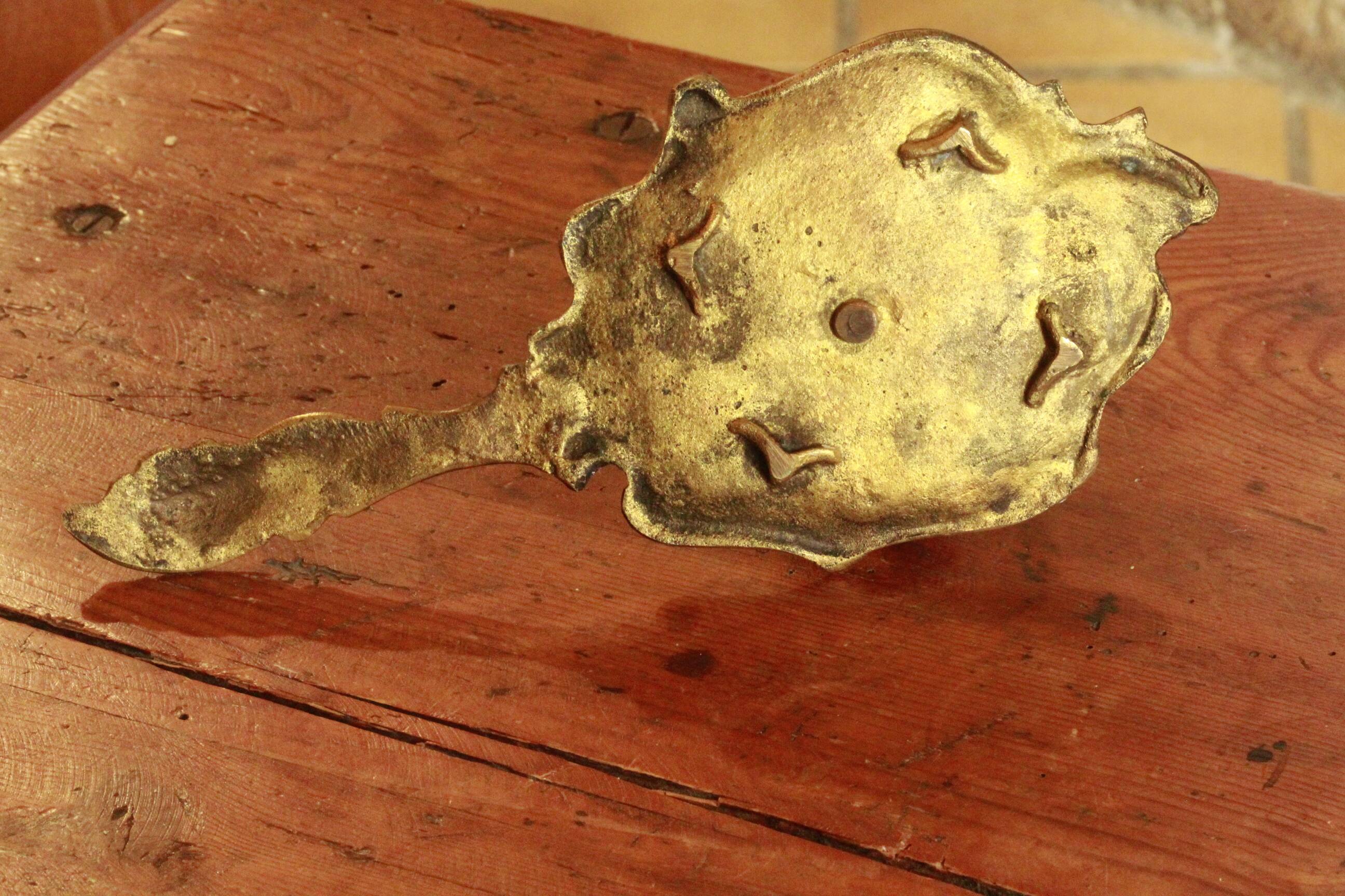 Old hand candle holder