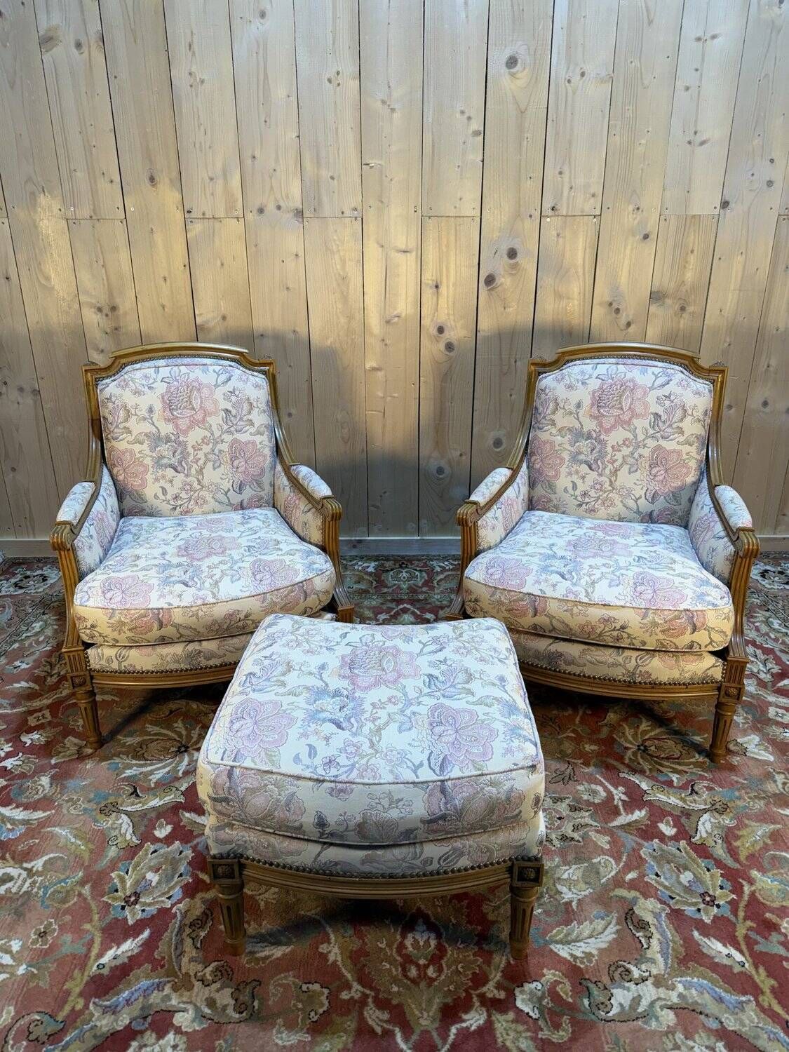 Pair of armchairs / bergères and footstool in Louis XVI style