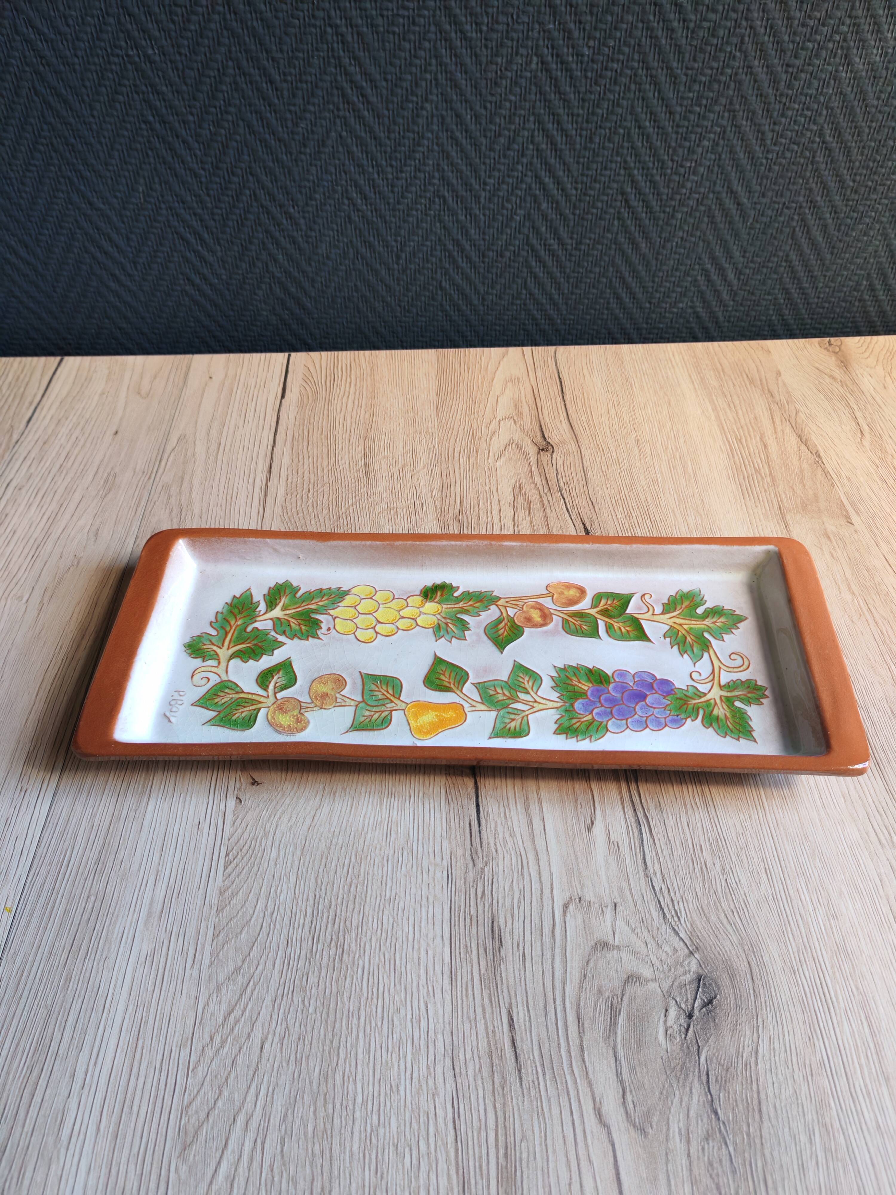 Terracotta plate signed P.Boy, glazed artisanal ceramics.