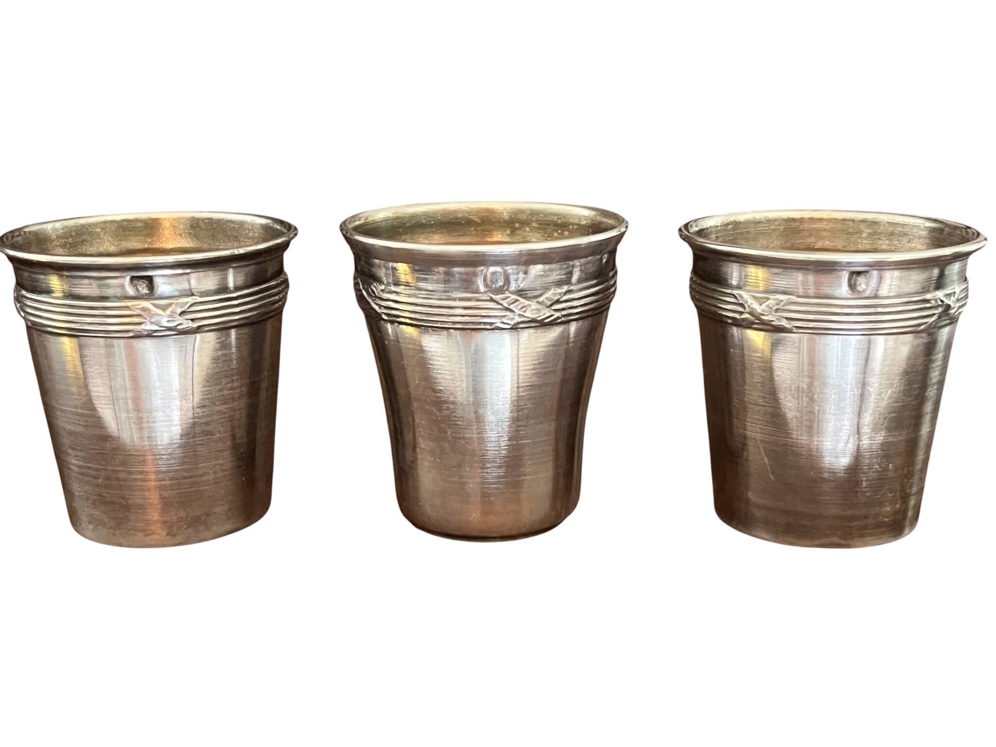 Silver-plated metal caviar service and 12 silver Minerva goblets, circa 1900