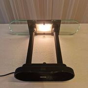 Desk lamp by “Robert Senneman”