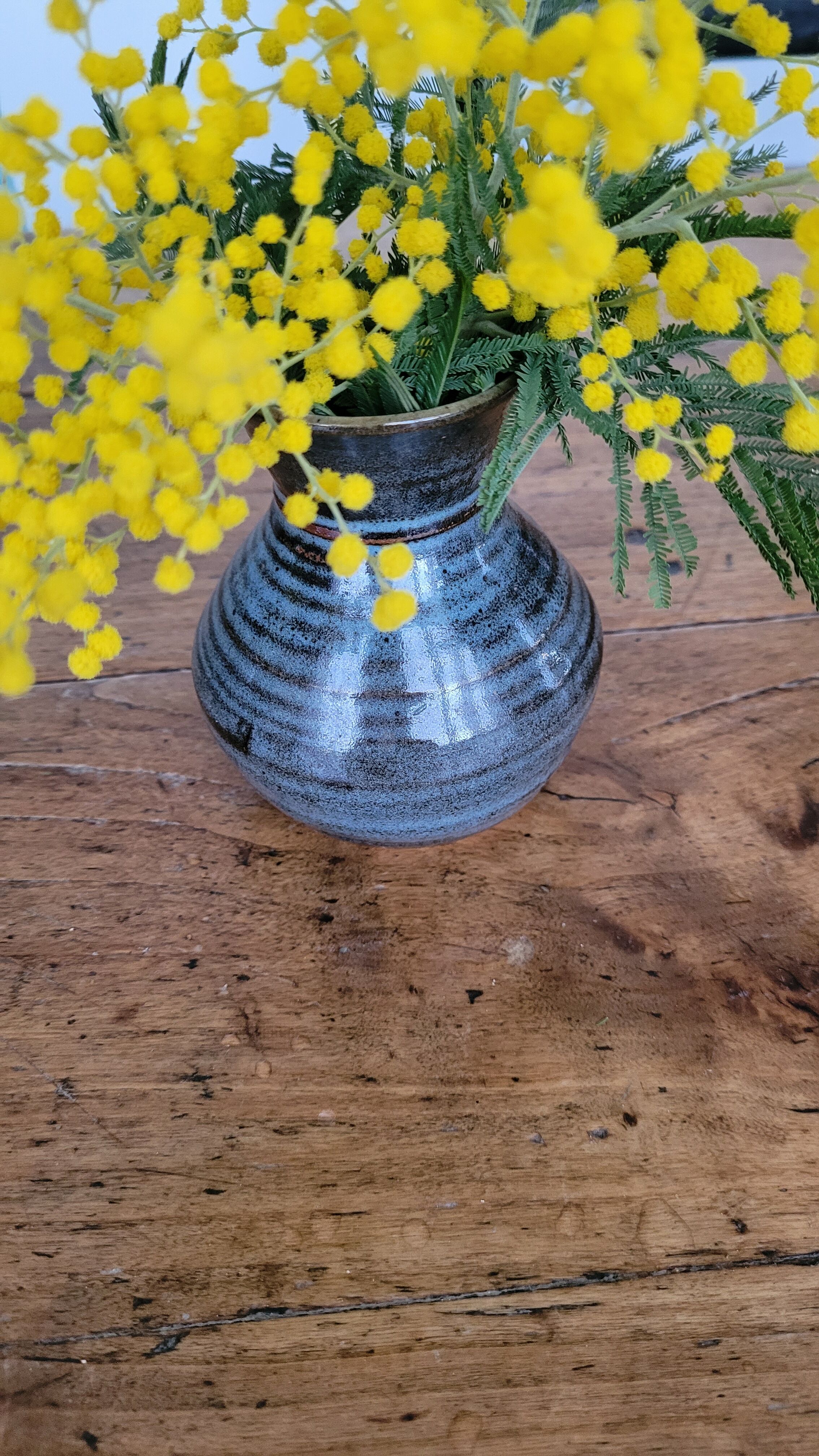 Small blue enamelled vase