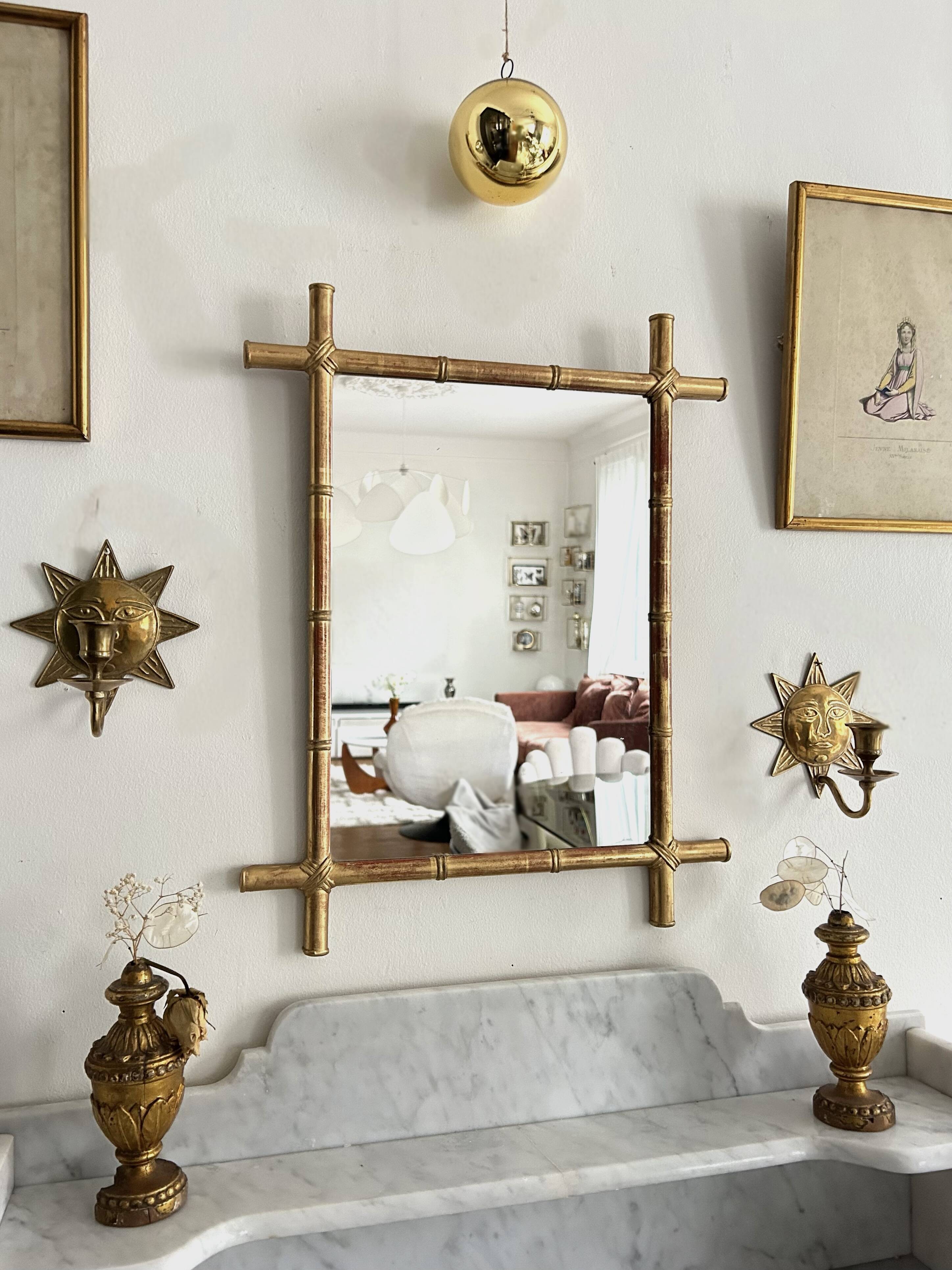 Mirror in gilded stucco, bamboo patina and gold leaf.