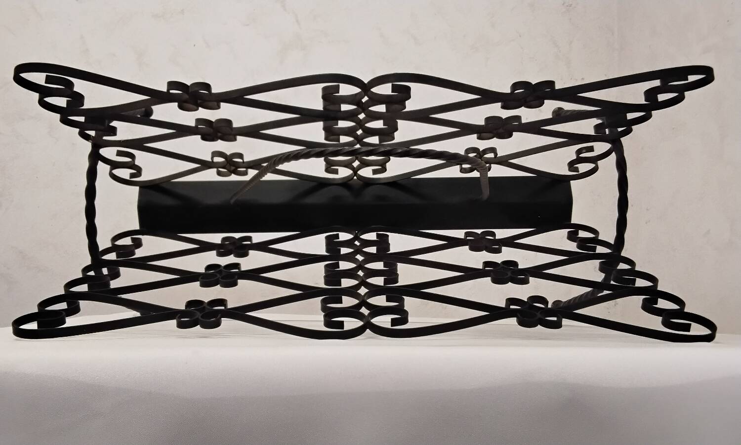 Wrought iron magazine rack signed CHATY Vallauris