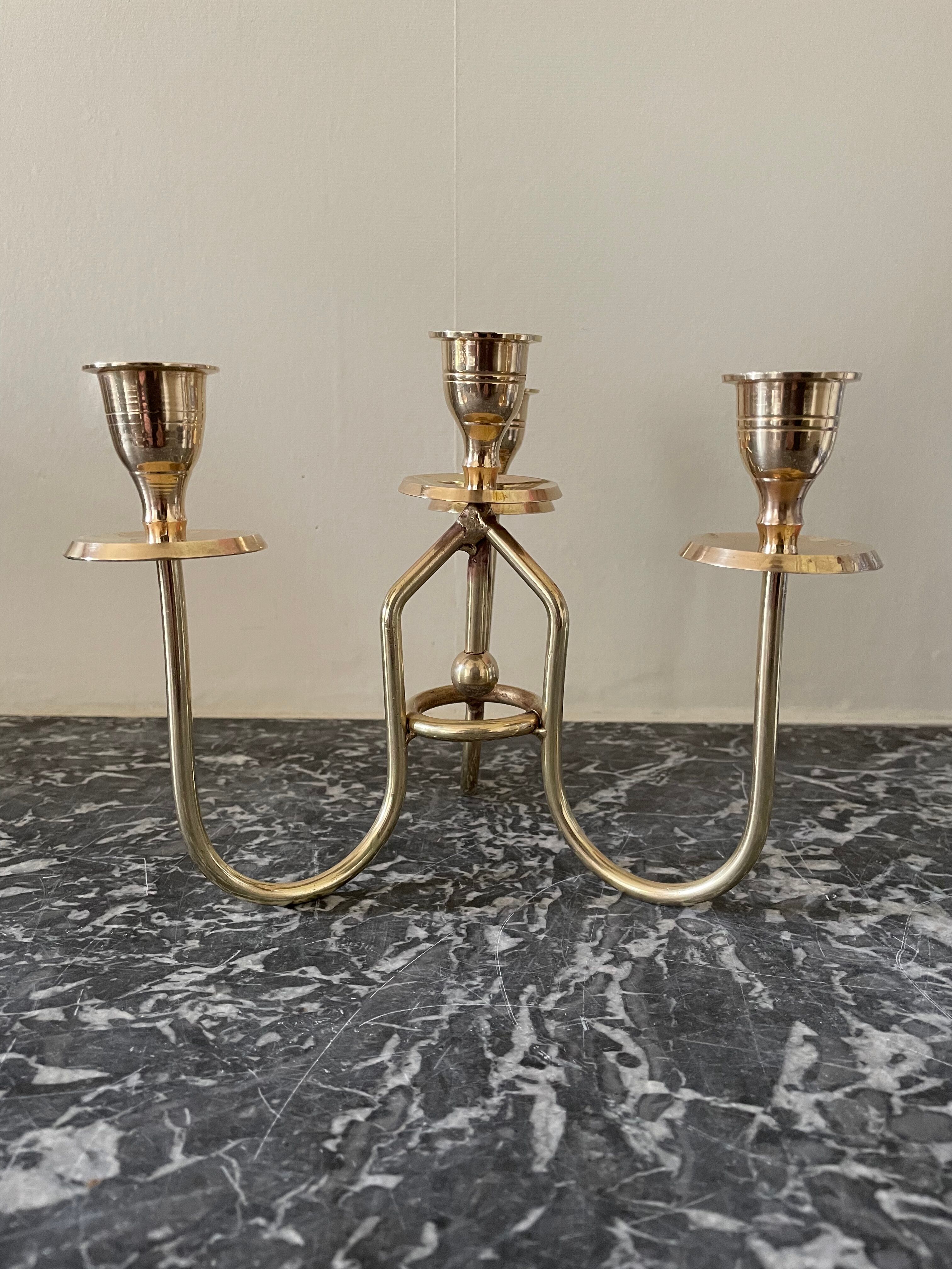 Golden brass candle holder
