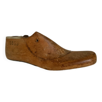 Old wooden shoe form