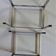 Vintage 1970s nesting tables in chrome and smoked glass, mid-century modernist style