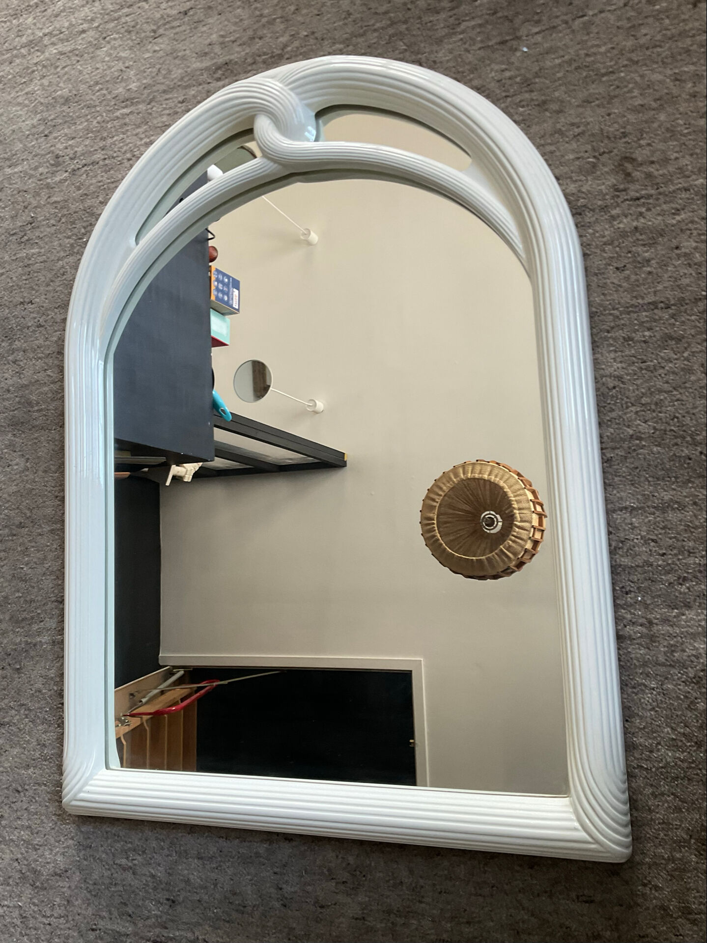 Vintage Art Deco style mirror in stained white wood.