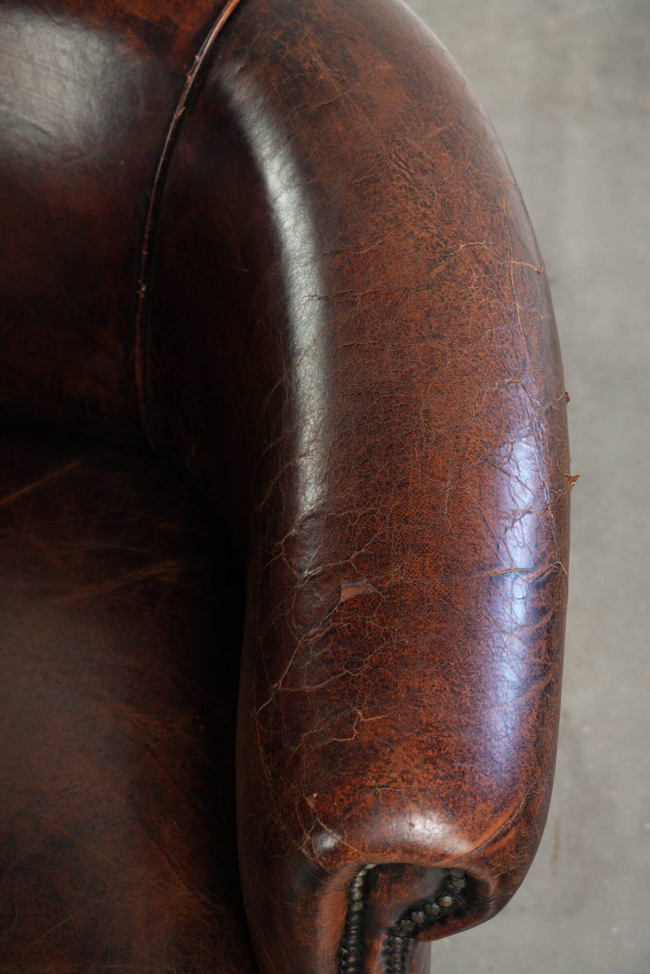 Vintage sheepskin club armchair with beautiful colours and a subtle size