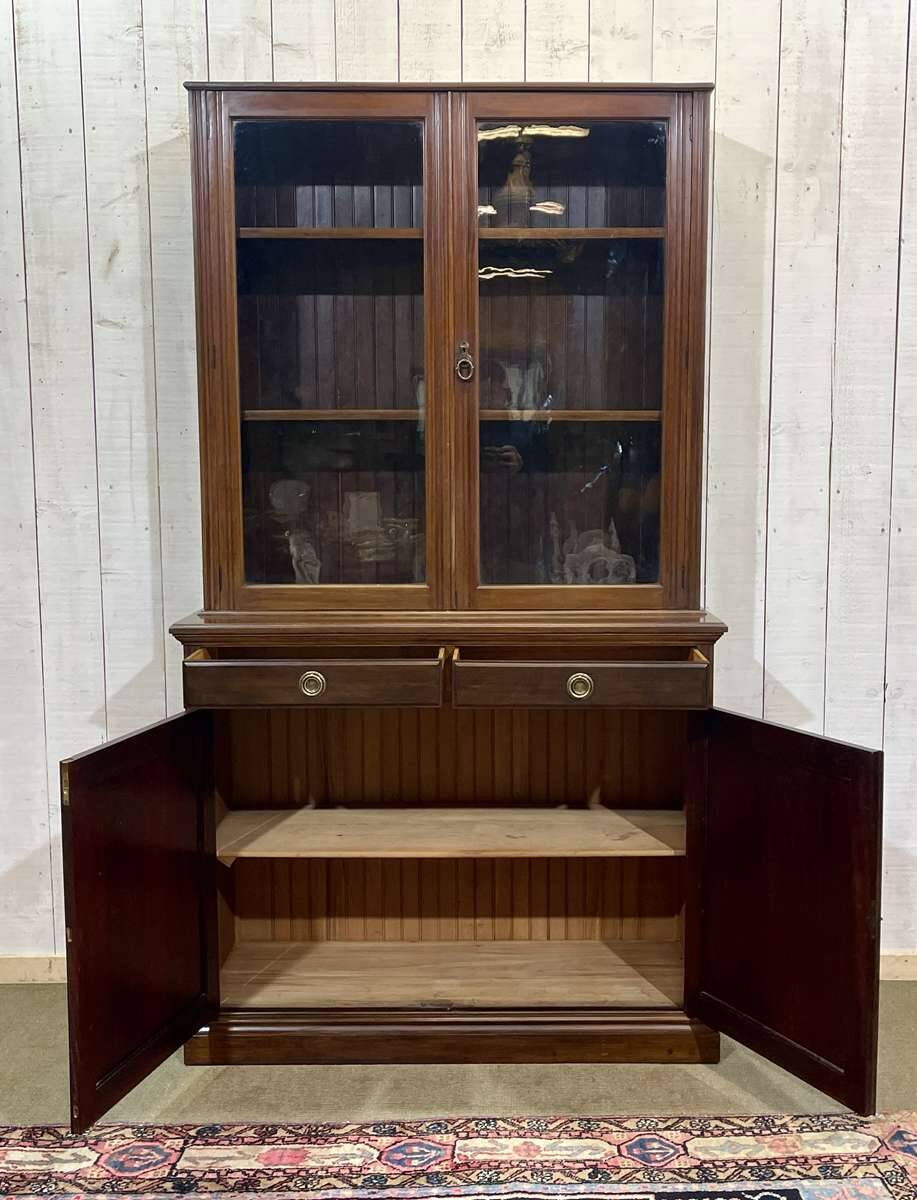 English walnut two-body library from the early 20th century.