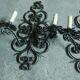 Two large wrought iron wall lights