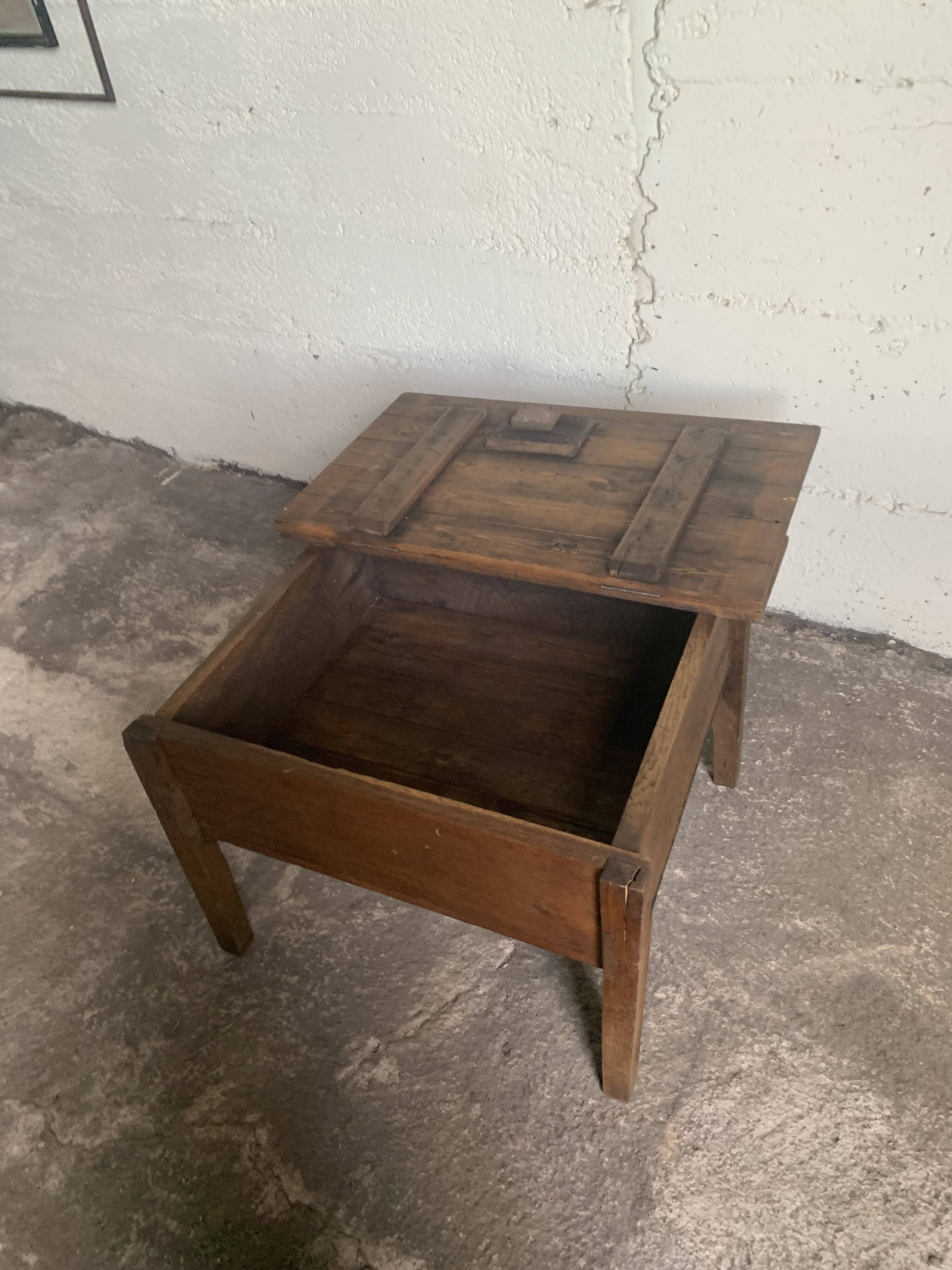 Coffee table with a key storage compartment.