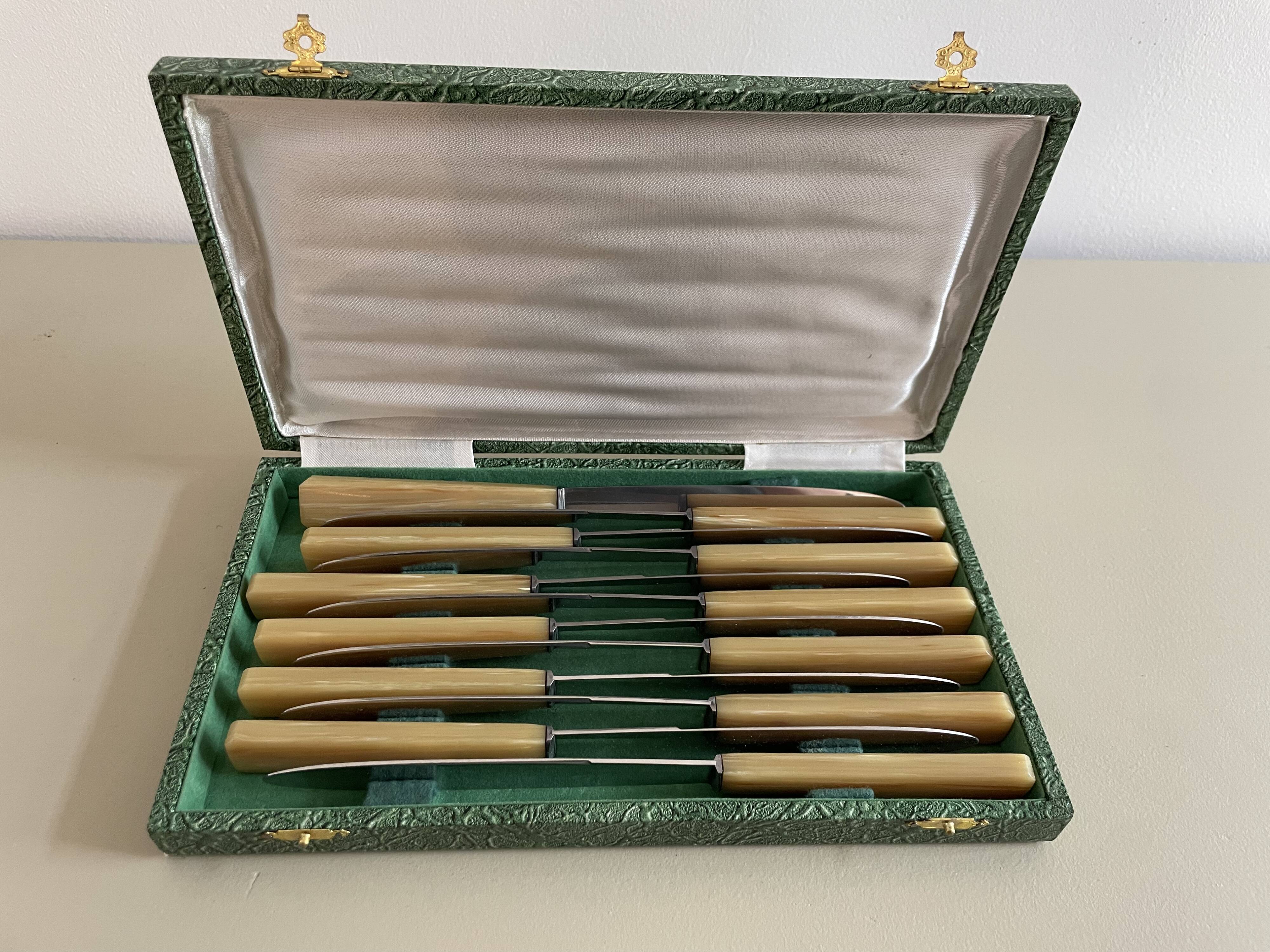 Set of 12 antique knives in green case