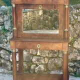 A small piece of Bonheur du jour with detached columns in Empire-era mahogany.