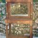 A small piece of Bonheur du jour with detached columns in Empire-era mahogany.