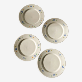 Lot d'assiettes en céramique, décorées de petites fleurs bleu et orange