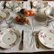 22 assiettes plates  porcelaine de Limoges , fleurs