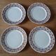 4 assiettes plates anciennes en terre de fer