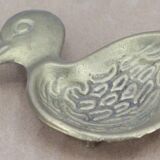 Empty brass duck pocket